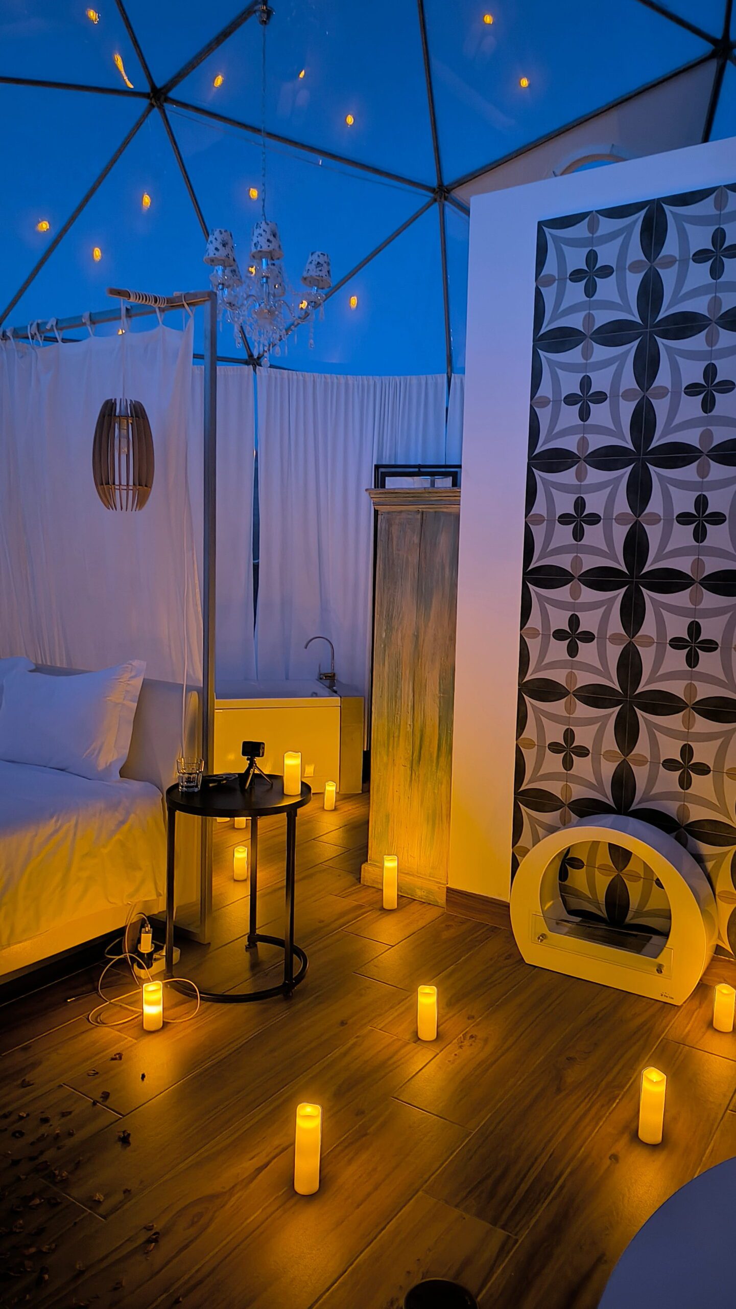 Candlelit path across the dome with decorative tiles for an intimate celebration